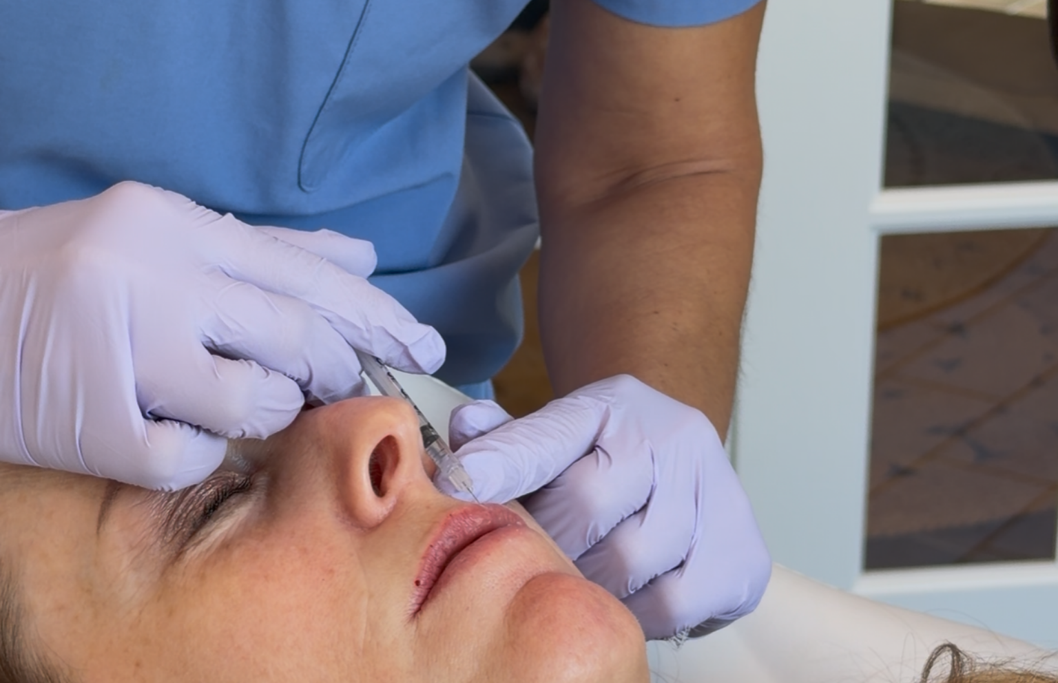 Taliah performing a focused injectable treatment at Tula Tu Aesthetics in The Woodlands, TX