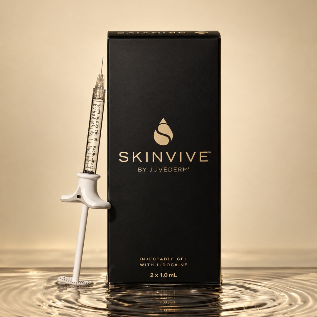 SKINVIVE by Juvéderm skin booster box and syringe on champagne marble at Tula Tu Aesthetics in The Woodlands, TX