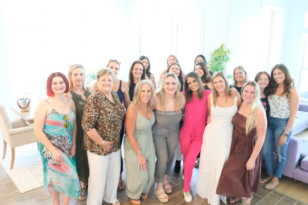 A group of colleagues gathered at an on-site corporate wellness Botox day hosted by Tula Tu Aesthetics in The Woodlands, TX